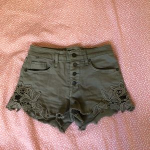 green high rise detailed jean shorts